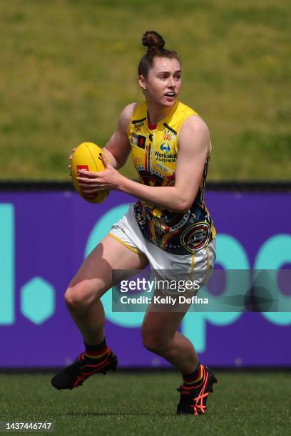 Eloise Jones of the Crows runs with the ball during the round 10 AFLW match between the St Kilda Saints and the Adelaide Crows at RSEA Park on...