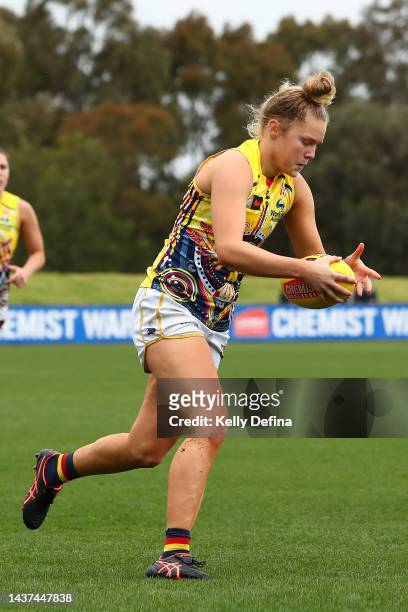 Zoe Prowse of the Crows runs with the ball during the round 10 AFLW match between the St Kilda Saints and the Adelaide Crows at RSEA Park on October...