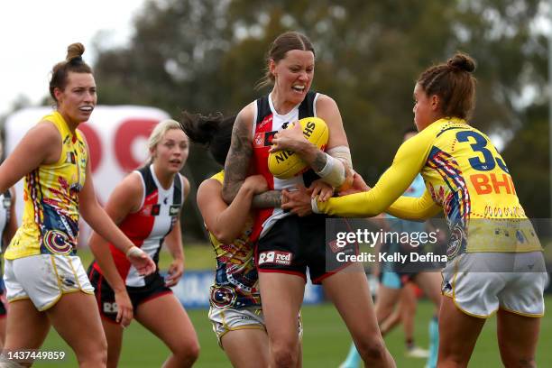 Bianca Jakobsson of the Saints is tackled during the round 10 AFLW match between the St Kilda Saints and the Adelaide Crows at RSEA Park on October...