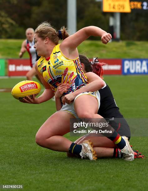 Abbie Ballard of the Crows is tackled during the round 10 AFLW match between the St Kilda Saints and the Adelaide Crows at RSEA Park on October 29,...