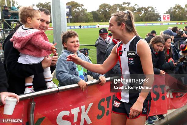 Saints players thank supporters during the round 10 AFLW match between the St Kilda Saints and the Adelaide Crows at RSEA Park on October 29, 2022 in...