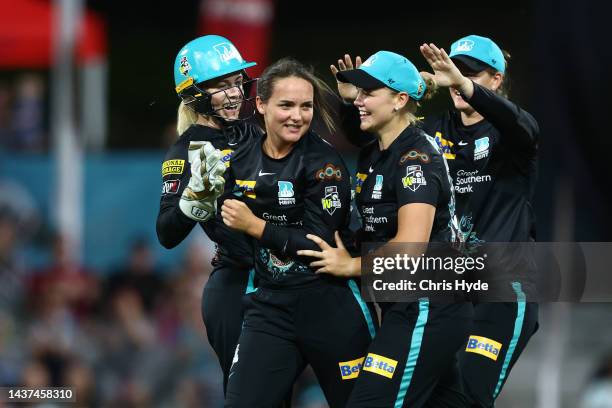 Amelia Kerr of the celebrates after dismissing Beth Mooney of the Scorchers during the Women's Big Bash League match between the Brisbane Heat and...