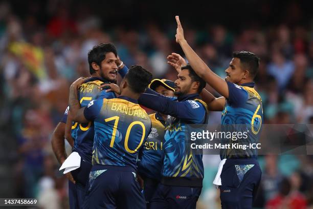 Kasun Rajitha of Sri Lanka celebrates with team mates after dismissing Kane Williamson of New Zealand during the ICC Men's T20 World Cup match...