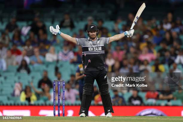 Glenn Phillips of New Zealand gestures to the bowler Chamika Karunaratne of Sri Lanka during the ICC Men's T20 World Cup match between New Zealand...
