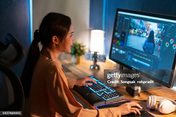 beautiful female video editor - office space movie stock pictures, royalty-free photos & images