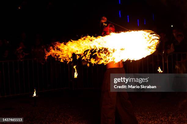 Devil swinging fireball on October 28, 2022 in Murska Sobota, Slovenia.
