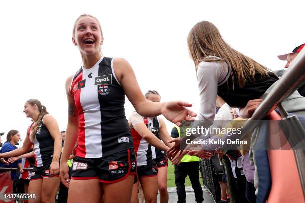 Saints players thank supporters during the round 10 AFLW match between the St Kilda Saints and the Adelaide Crows at RSEA Park on October 29, 2022 in...