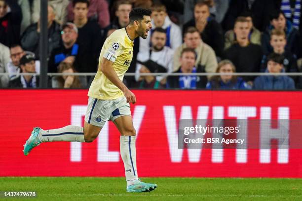 Mehdi Taremi of FC Porto celebrates after scoring his sides fourth goal during the Group B - UEFA Champions League match between Club Brugge KV and...