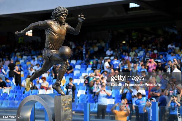 Diego Maradona statue is seen inside the stadium prior to the Serie A match between SSC Napoli and US Sassuolo at Stadio Diego Armando Maradona on...