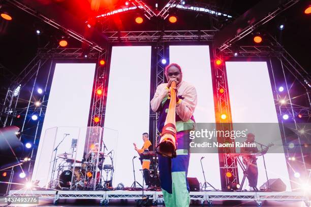 Baker Boy plays the didgeridoo during a performance on The Park stage during 2022 Penfolds Victoria Derby Day at Flemington Racecourse on October 29,...