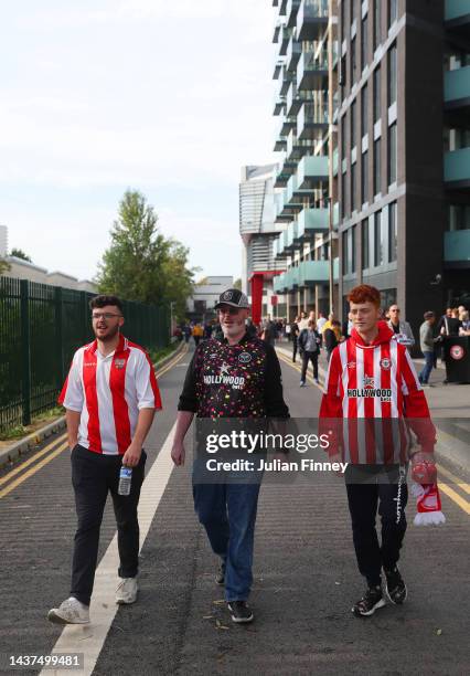 Fans of Brentford arrive prior to kick off of the Premier League match between Brentford FC and Wolverhampton Wanderers at Brentford Community...