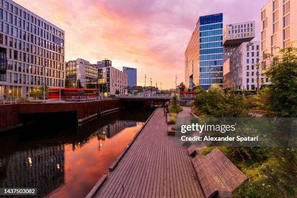 canal and modern buildings at oslo, norway - oslo foto e immagini stock