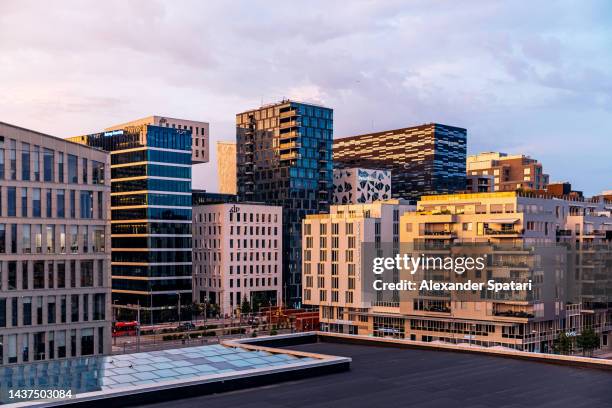 office buildings in bjorvika neighbourhood high angle view, oslo, norway - oslo business stock pictures, royalty-free photos & images