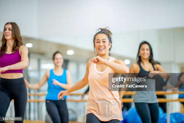 women's aerobics class - aerobics stock pictures, royalty-free photos & images