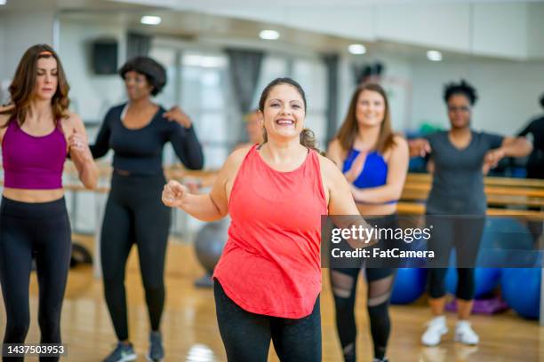 women's aerobics class - zumba stockfoto's en -beelden