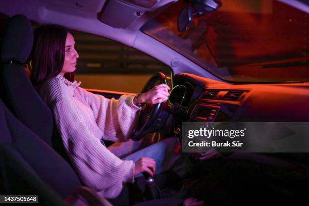 navigation , map and journey , female driver , female lifestyle - car red light stock pictures, royalty-free photos & images