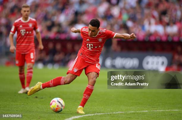 Jamal Musiala of Bayern Munich scores their team's second goal during the Bundesliga match between FC Bayern München and 1. FSV Mainz 05 at Allianz...