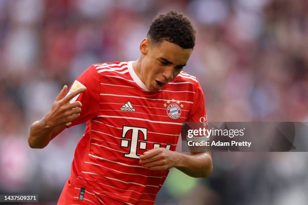 Jamal Musiala of Bayern Munich celebrates after scoring their team's second goal during the Bundesliga match between FC Bayern München and 1. FSV...