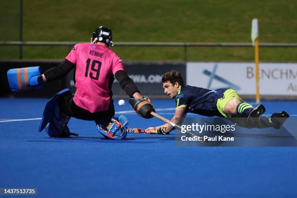 Jeremy Edwards of the Tigers takes a shot on goal in the shoot out during the round five Hockey One League match between Perth Thundersticks and...