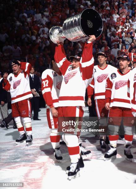 Igor Larionov of the Detroit Red Wings celebrates the Stanley Cup victory circa 1997 in Detroit, Michigan.