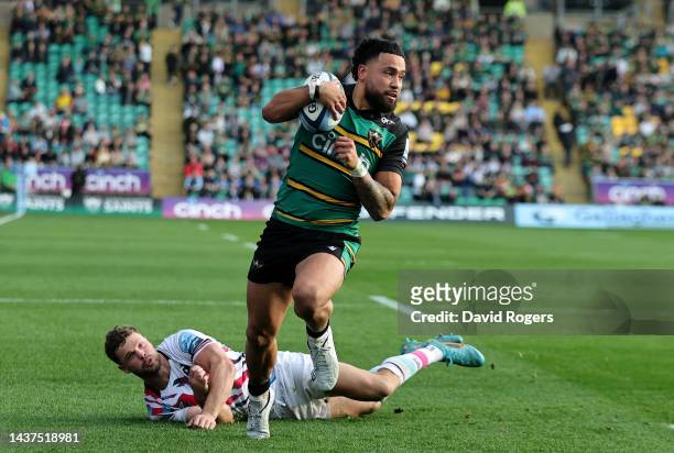 Matt Proctor of Northampton Saints goes past Henry Purdy to score their fifth try during the Gallagher Premiership Rugby match between Northampton...