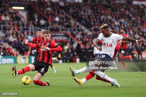 Ryan Sessegnon of Tottenham Hotspur scores their side's first goal whilst under pressure from Chris Mepham of AFC Bournemouth during the Premier...