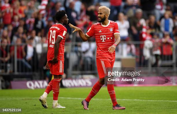 Eric Maxim Choupo-Moting of Bayern Munich celebrates with teammates after scoring their team's sixth goal during the Bundesliga match between FC...
