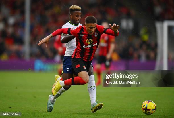 Marcus Tavernier of AFC Bournemouth is challenged by Ryan Sessegnon of Tottenham Hotspur during the Premier League match between AFC Bournemouth and...
