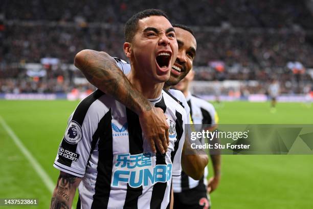 Miguel Almiron of Newcastle United celebrates after scoring their side's fourth goal with Callum Wilson during the Premier League match between...