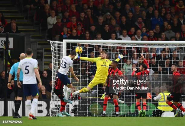Ben Davies of Tottenham Hotspur scores their side's second goal as Mark Travers of AFC Bournemouth attempts to make a save during the Premier League...