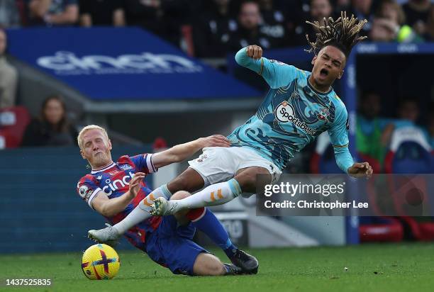 Sekou Mara of Southampton is tackled by Will Hughes of Crystal Palace during the Premier League match between Crystal Palace and Southampton FC at...