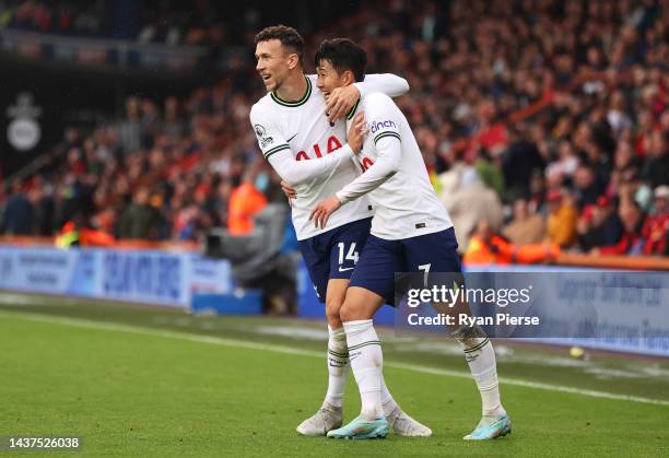 Ivan Perisic of Tottenham Hotspur celebrates with teammates Son Heung-Min after Rodrigo Bentancur scores their side's third goal during the Premier...