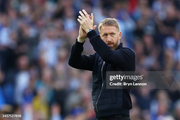 Graham Potter, Head Coach of Chelsea applauds the fans after their sides defeat during the Premier League match between Brighton & Hove Albion and...