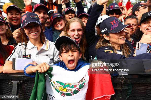 Sergio Perez of Mexico and Oracle Red Bull Racing fans show their support at the fan stage prior to final practice ahead of the F1 Grand Prix of...