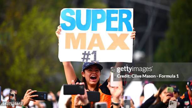 Max Verstappen of the Netherlands and Oracle Red Bull Racing fan shows their support at the fan stage prior to final practice ahead of the F1 Grand...