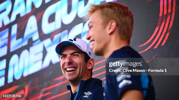 Nicholas Latifi of Canada and Williams and Alexander Albon of Thailand and Williams talk to the crowd on the fan stage prior to final practice ahead...