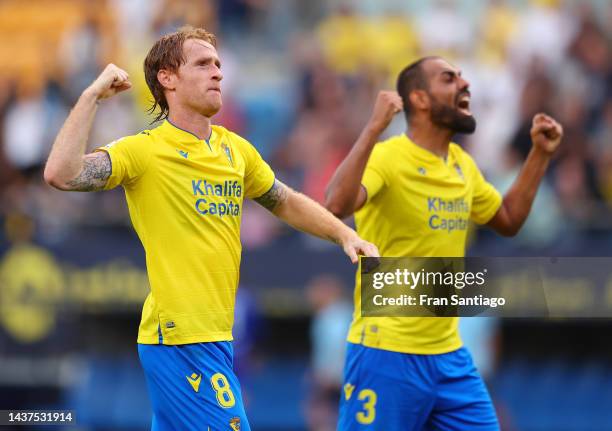 Alex Fernandez and Fali of Cadiz CF celebrate following victory in the LaLiga Santander match between Cadiz CF and Atletico de Madrid at Estadio...