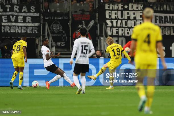 Julian Brandt of Borussia Dortmund scores their side's first goal during the Bundesliga match between Eintracht Frankfurt and Borussia Dortmund at...