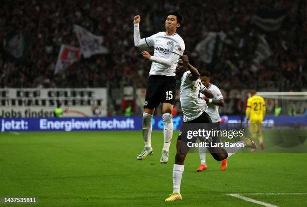 Daichi Kamada of Eintracht Frankfurt celebrates after scoring their side's first goal during the Bundesliga match between Eintracht Frankfurt and...