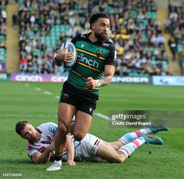 Matt Proctor of Northampton Saints goes past Henry Purdy to score their fifth try during the Gallagher Premiership Rugby match between Northampton...