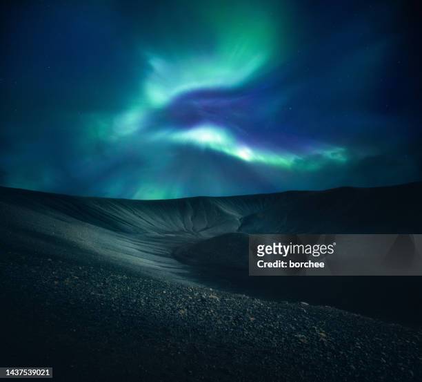 northern lights above volcanic crater - aurora panorama stock pictures, royalty-free photos & images