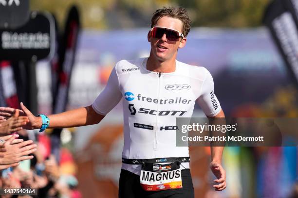 Magnus Ditlev of Denmark celebrates as he finishes in third place during the IRONMAN 70.3 World Championship on October 29, 2022 in St George, Utah.