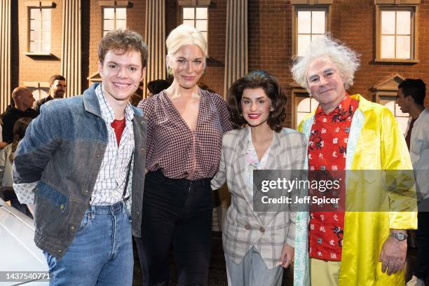 Hannah Waddingham meets cast members Ben Joyce , Amber Davies and Roger Bart onstage after watching Back To The Future: The Musical at Adelphi...