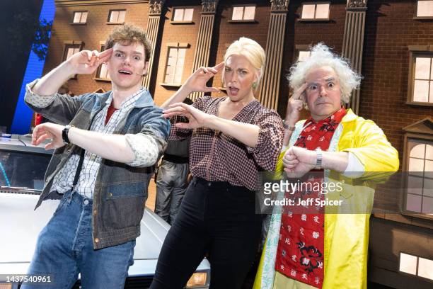 Hannah Waddingham meets cast members Ben Joyce and Roger Bart onstage after watching Back To The Future: The Musical at Adelphi Theatre on October...