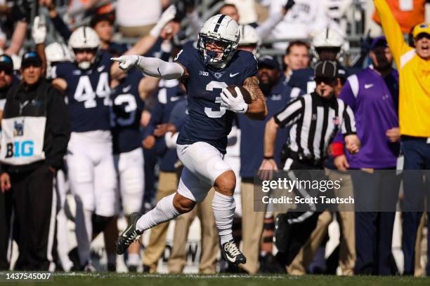 Parker Washington of the Penn State Nittany Lions runs for a touchdown against the Ohio State Buckeyes during the first half at Beaver Stadium on...