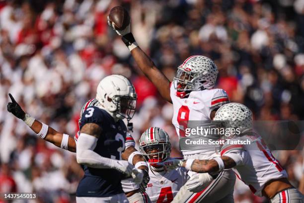 Zach Harrison of the Ohio State Buckeyes celebrates after intercepting a pass against the Penn State Nittany Lions during the first half at Beaver...