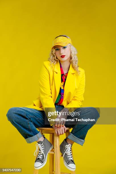 beautiful woman wearing colorful outfit - blazer foto e immagini stock