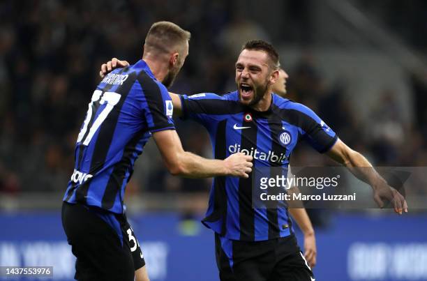 Stefan de Vrij of FC Internazionale celebrates with teammate Milan Skriniar after scoring their team's first goal during the Serie A match between FC...