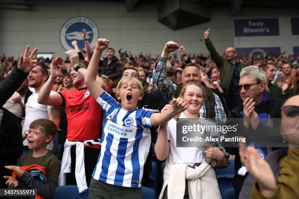 Brighton fans celebrate their sides first goal during the Premier League match between Brighton & Hove Albion and Chelsea FC at American Express...