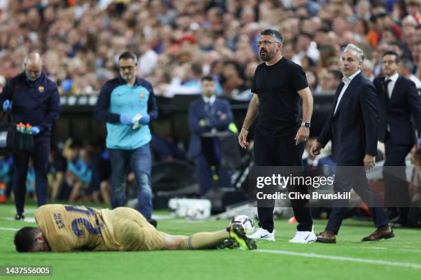 Gennaro Gattuso, Head Coach of Valencia CF looks on as Eric Garcia of FC Barcelona lays on the ground during the LaLiga Santander match between...